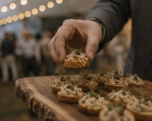 Catering staff serving canapes at an event, managed with Liveforce catering staff scheduling software